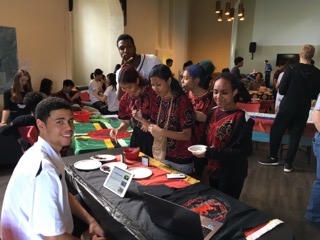 Seniors Malik Eichler and Opong Bramble sample the offerings of the Indonesian table.