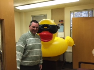 Parker posing with his giant inflated duck.  Photo provided by Betty Shaw.