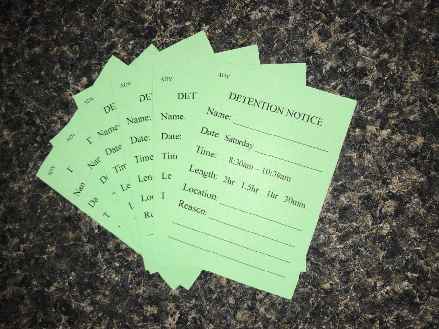 A fresh stack of detention slips waiting to be written and distributed; they only include a Saturday option. Photo by Marie Hua.